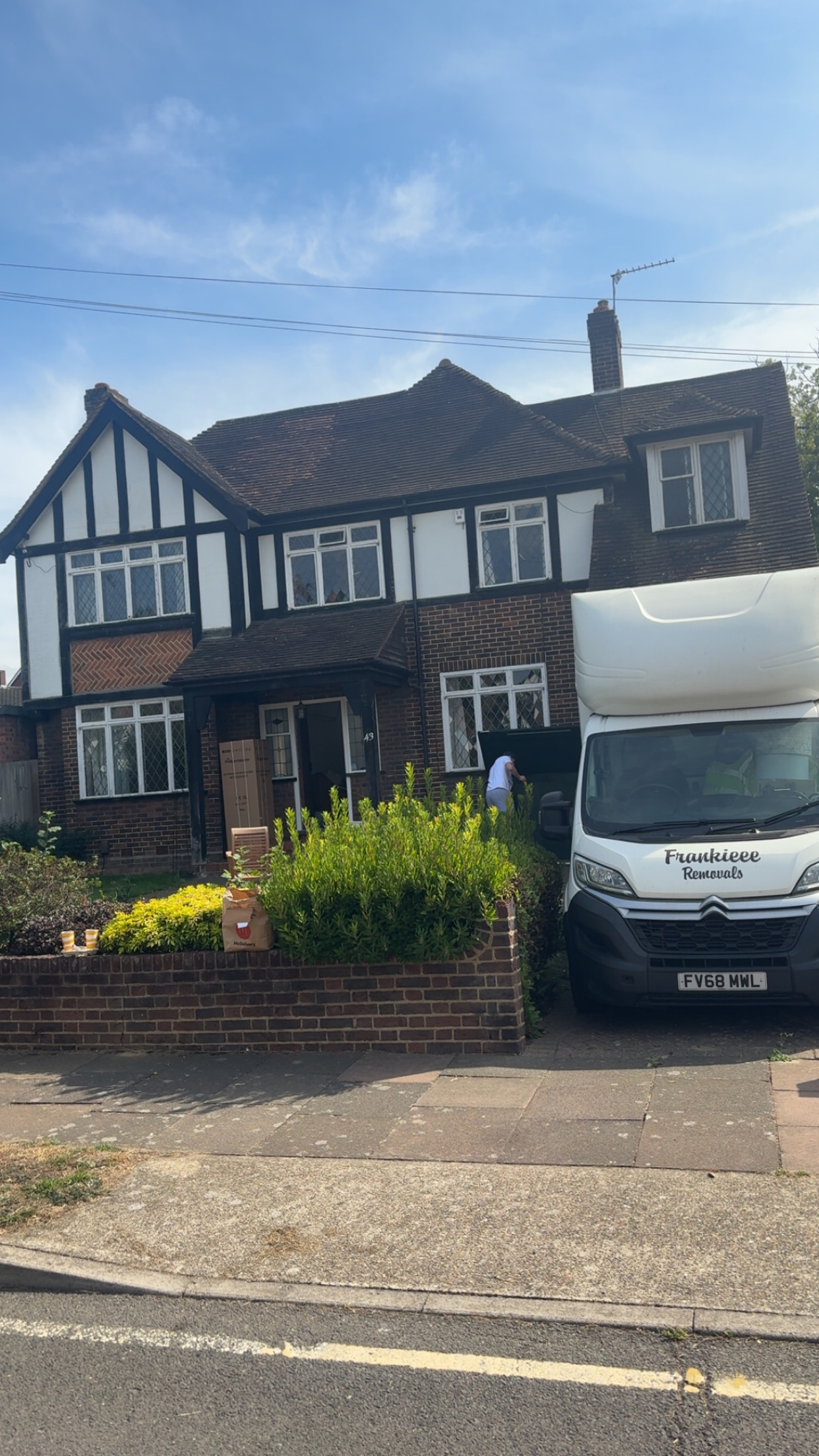 Luton van at a suburban London house ready to load